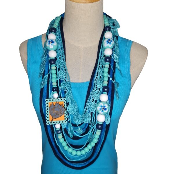 Blue and White Tshirt scarf with a protea pendant and lace